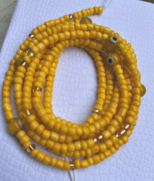 Evil eye (yellow) tie on waist bead