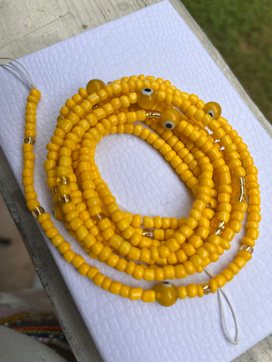 Evil eye (yellow) tie on waist bead